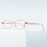 Women's rose gold metal prescription glasses with crystal-embellished temples, adjustable nose pads, elegant lightweight myopia eyewear for daily wear.