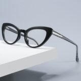 Black cat-eye acetate myopia glasses with glitter silver temples, stylish prescription eyewear for women.