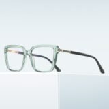 ransparent green prescription glasses with TR90 frame, gold glitter temple accents, lightweight unisex design, by boboeye.