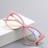 Pink cat-eye prescription glasses with gold metal temple accents, lightweight TR90 frame for women daily wear office fashion.