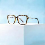 Tortoiseshell prescription glasses with acetate frame, gold metal temples, oversized square design for women, by boboeye.